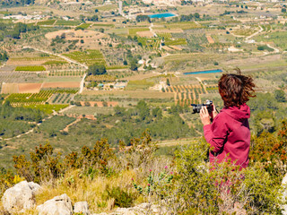 Poster - Woman take photo in mountains