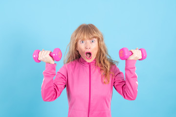 adult woman with sportswear doing weights or exercises isolated on background