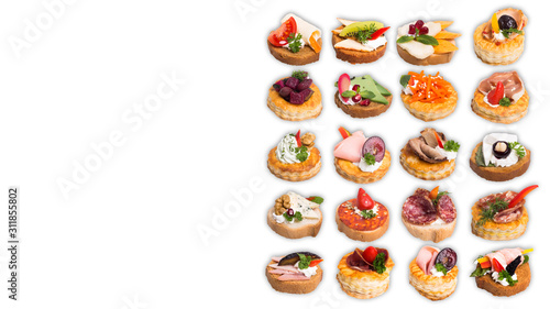 Assortment of tasty canapes on white background © grigoryepremyan