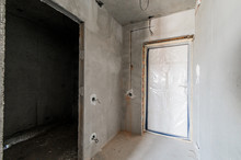 Russia, Moscow- August 05, 2019: Interior Room Rough Repair For Self-finishing. Interior Decoration, Bare Walls Of The Room, Stage Of Construction