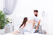 © be free - Playing together. Small child and bearded man playing pillow fight. Happy family enjoy playing in bedroom. Playing fighting game. Playtime and leisure. Play fun