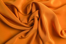 Golden Silk Or Satin Luxury Fabric Texture Can Use As Abstract Background.