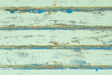 Wood board with peeling paint