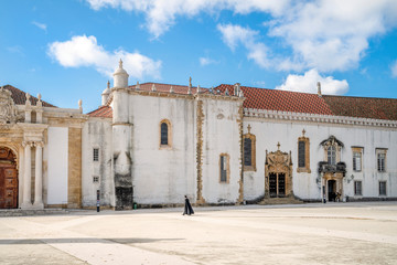 Wall Mural - Student walking in University of Coimbra, Portugal