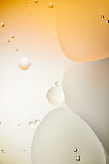 light orange and grey color abstract background from mixed water and oil