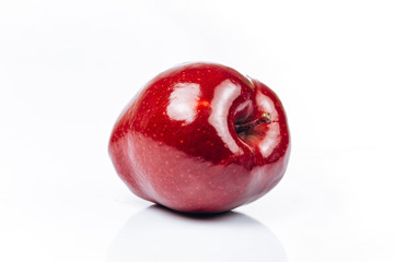 Wall Mural - Fresh red apple on white background with beautiful reflection