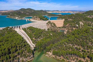 Wall Mural - Aerial view of Gaitanejo reservoir and dam near the Royal El Chorro Royal Trail. Spain