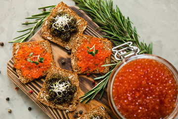 chic expensive red caviar, pike caviar and black caviar for a snack