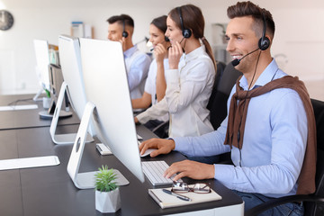 Poster - Team of technical support agents working in office