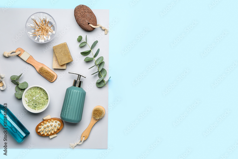 Set of bath accessories on color background