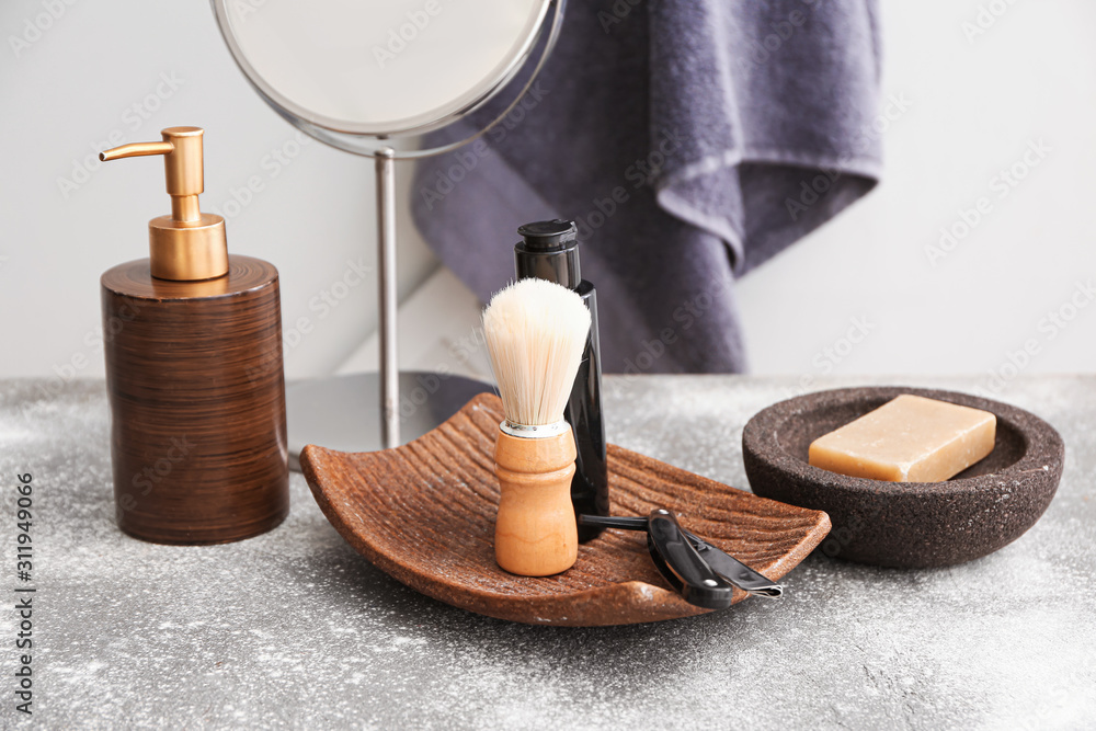 Set of bath accessories on table