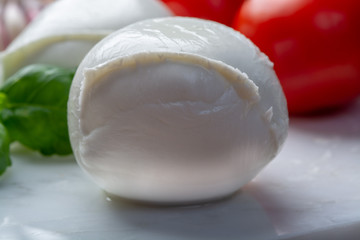 Balls of buffalo mozzarella, soft Italian scheese made from the milk of Italian Mediterranean buffalo