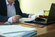 © kuznechik42 - Business man in office busy with business work