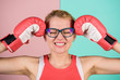© be free - feeling stressed. woman in glasses and boxing gloves. see the success is near. sexy and confident secretary. choose healthy way of life. huge sense of self confidence. Boxing makes her super fit