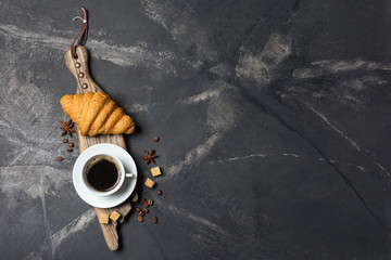 Wall Mural - Appetizing crispy croissant and coffee for tasty breakfast