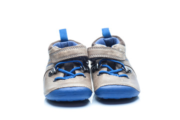 pair of blue shoes isolated on white background