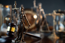 Law Symbol Composition And Background. Judge's Gavel, Themis Statue And Scale.