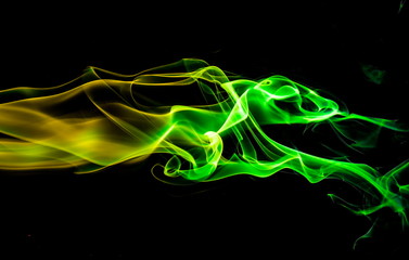 Colored smoke on black background