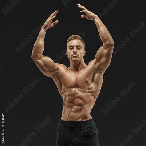 Leinwand Poster Shot of healthy muscular young man