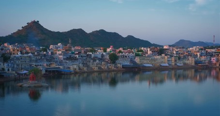 Fototapete - View of famous indian hinduism pilgrimage town sacred holy hindu religious city Pushkar with Pushkar ghats. Rajasthan, India. Horizontal pan