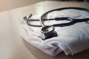 stethoscope on a table background