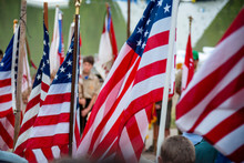 Multiple American Flags Are Part Of A Boy Scout Camp Presentation.