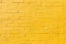 Retro Bright Yellow Painted Brick Wall Background Texture