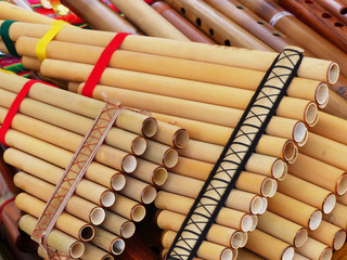 Pan flute o panpipes flute, folk musical instrument, at the market in Cuenca, Ecuador