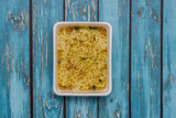 Fototapeta Mapy - instant noodles in a white container