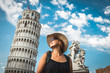 Tourist woman or girl in pisa tower, Italy