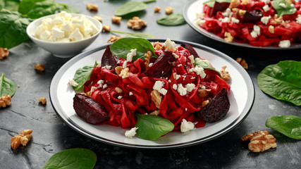 Wall Mural - Roast Beetroot Pasta with spinach, walnuts and feta cheese. healthy food