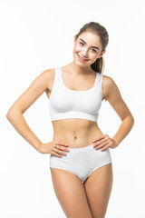 Wall Mural - Attractive young woman in white underwear isolated on white background.