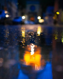 Fototapeta Natura - Rainy street with reflections of cars and lights