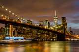 Fototapeta  - View of Manhattan skyline and Brookyn bridge from Brooklyn side after sunset , New york city