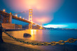 Beautiful view of the glowing Golden Gate in San Francisco after sunset