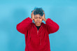 © carballo - young woman or afro american girl isolated on blue background with expression