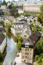 Panoramic View Of The Casemates And The Historic Center Of Luxembourg City. Beautiful Aerial View From The Balcony Of Europe. Roofs Of Buildings, Medieval Architecture And Bridge, River And Wall