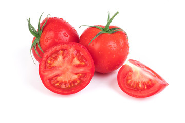 Wall Mural - Fresh red tomatoes isolated on white background. Whole and a half