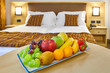 © DannyIacob - complimentary fruit basket in the hotel room,with free space for the welcome message