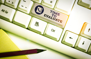 Wall Mural - conceptual hand writing showing time to evaluate. concept meaning moment rate used before products o