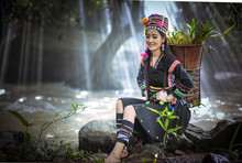 Beautiful Hmong Girl Lying On The Edge Of The Stream