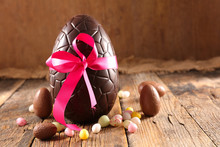 Chocolate Easter Egg On Wood Background