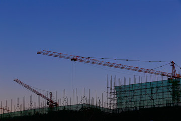 Wall Mural - The crane is working at the construction site