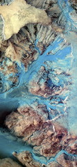 Wall Mural - vertical abstract photography of the deserts of Africa from the air, aerial view of desert landscapes, Genre: Abstract Naturalism, from the abstract to the figurative, 