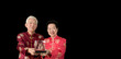 © glowonconcept - Asian senior couple celebrate Chinese new year in red traditional costume