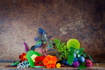 Wall Mural - Autumn Leaves, Flowers, Berries on a wooden background