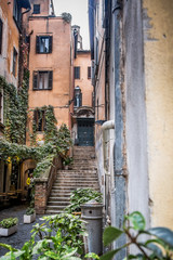 Canvas Print - A beautiful Roman courtyard on Coronari street. Selective focus.   Rome, Lazio, Italy