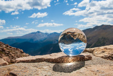 Glass Ball In Rocky Mountains