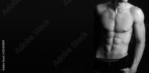 Fotografía Muscular fit male body , black and white photo