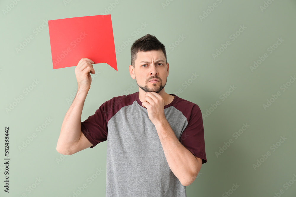 Thoughtful man with blank speech bubble on color background